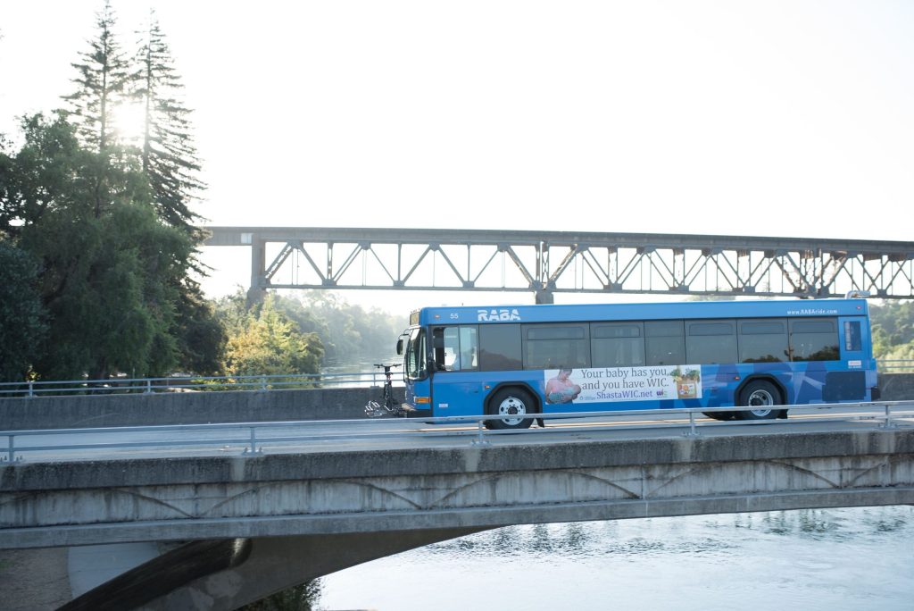 RABA Bus on Court Crossing Sacto River w- Train Trestle in Background